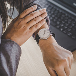 Woman checking her watch