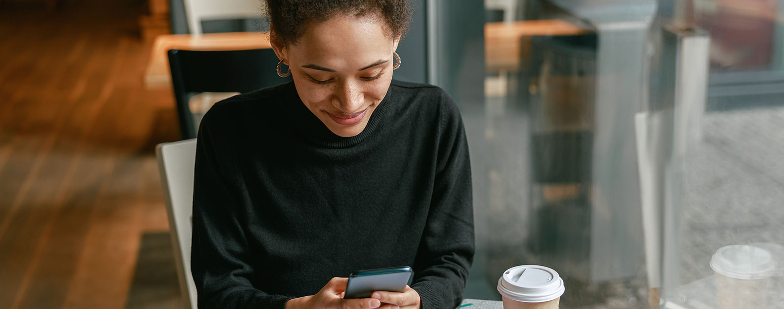 Woman reading Connects Contacts email Woman reading Connects Contacts email